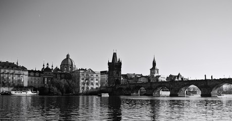 Panoramic view of the Charles Bridge and the old towers and buildings of Prague near the Vltava river (Prague, Czech Republic, Europe)