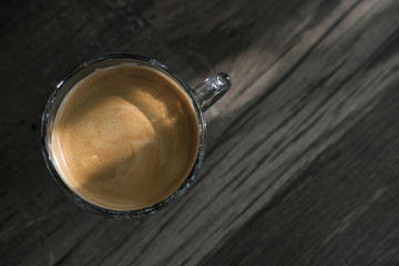 Close-up of espresso pouring from coffee machine. Professional coffee brewing