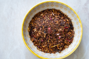 Winter Berry Dried Rooibos Tea Pieces with Dry Strawberry, Hibiscus, Flavoring, Cinnamon, Cloves, Rosehip, Apple, Calendula, Vanilla bits.
