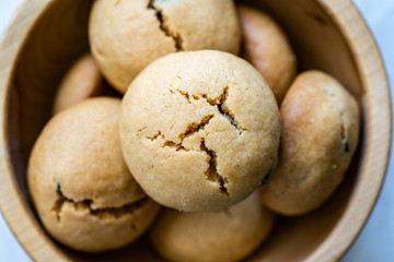 Healthy Organic Freshly Baked Homemade Peanut Butter Cookies in Wooden Bowl.