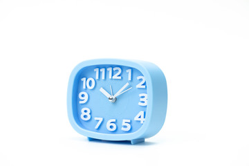 Blue plastic alarm clock time: 10.05 close up isolated on white background. Single object . concept of freedom time for LGBT