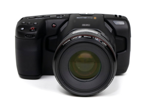 Port Melbourne, Australia 22.04.2020 Blackmagic Pocket Cinema Camera 6K with Canon EF-50mm 1.2 USM lens full face view isolated on white background