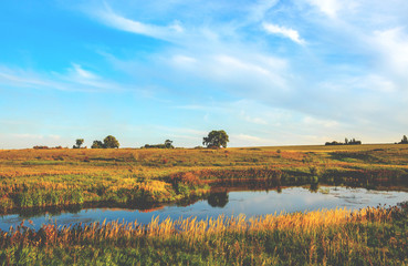 autumn landscape with trees and river