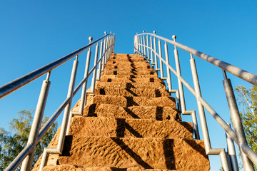 Sandstone stairs in the blue sky