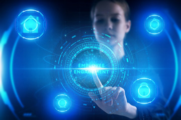 Business, Technology, Internet and network concept. Young businessman working on a virtual screen of the future and sees the inscription: Employee engagement