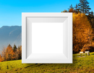 White photo frame on background with autumn and yellow forest, mock up 