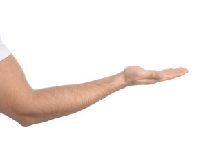 Man extending hand on white background, closeup