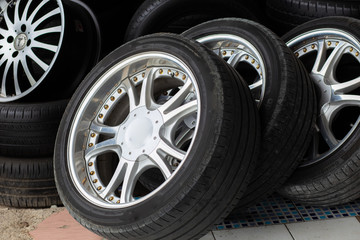Satck of car tires texrture background  in automobile store