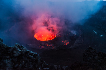 Crater of Nyiragongo volcano during the dusk time