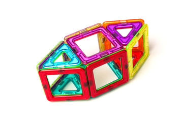 Children's toy magnetic designer, isolated on white background. close-up