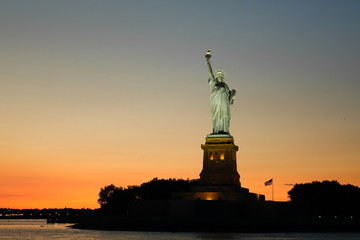 statue of liberty at sunset