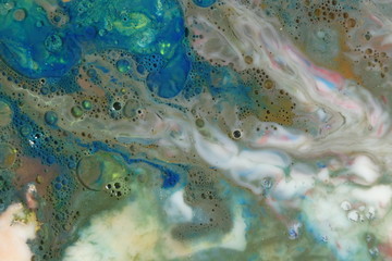 Abstract liquid ink marble color waves and bubbles