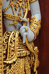 Deva statue in Wat Phra That Chohae in Phrae province, Northern Thailand.