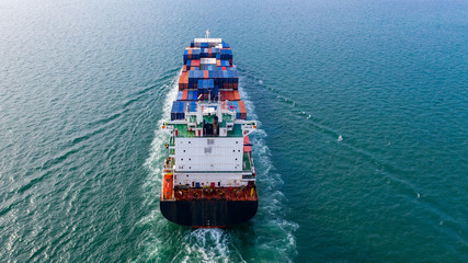 Fototapeta premium Aerial view container cargo ship, import export commerce global business trade logistic and transportation of worldwide by container cargo ship boat in the open sea, Freight shipping maritime.