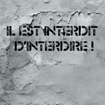 Wall with the French 1968 slogan "il est interdit d'interdire", meaning: "It is forbidden to forbid"