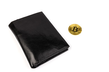 Metal gold bitcoin with black leather wallet on white background. Business, money, cryptocurrency concept.