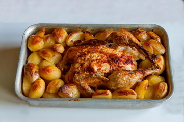 Appetite portion a whole roasted chicken with tasty roasted  potatoes, Sofia, Bulgaria  