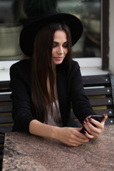 A person sitting on a table. High quality photo