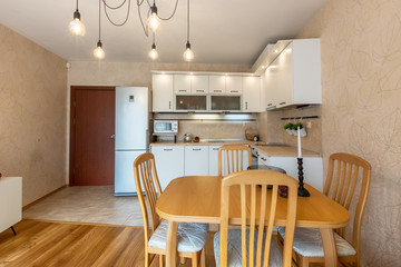 New modern kitchen. New home. Interior photography. Wooden floor.