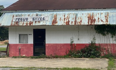 Abandoned Old Building with Jesus Saves