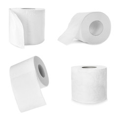 Set with rolls of toilet paper on white background