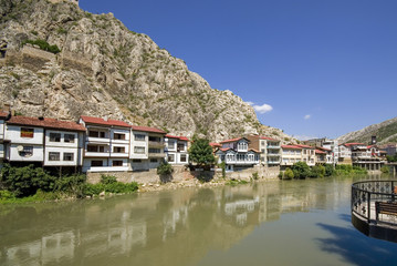 Fototapeta premium Amasya it is located inside the Black Sea Region.City is known as Ottoman's prince city. Amasya landscape beautiful river with clouds Clock Tower and Old Ottoman Amasya, Turkey.