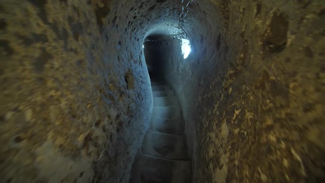 Staircase in the cave. Ancient Christian caves in Cappadocia. Turkey.