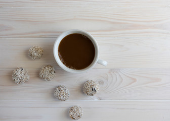 No-cook energy bites, Healthy organic energy granola bites with nuts, cacao, banana and honey - vegan vegetarian raw snack or meal