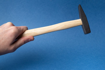 hammer with wooden handle close-up