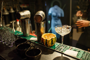 the bartender prepares a cocktail in the style of Halloween
