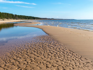 seascape on a sunny spring day, sandy sea shore,