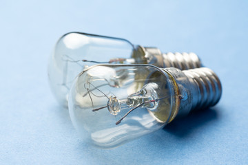 light bulbs on blue background close-up