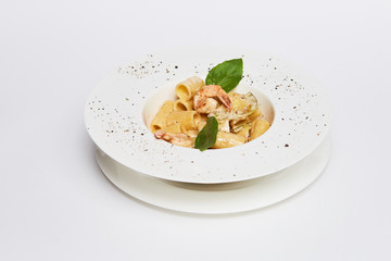 pasta rigatoni with shrimp plate of food on a table