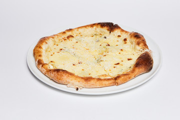 A slice of pizza on a plate