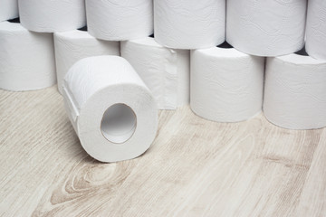 Many rolls of white toilet paper