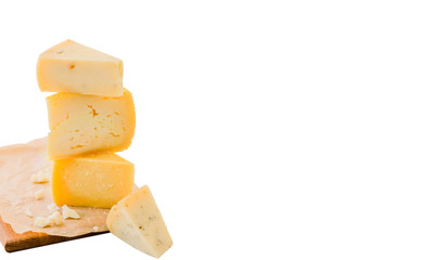 Different types of delisious cheese on wooden board isolated on white background, copy space