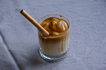 Iced Dalgona Coffee, Whipped Trendy Korean Coffee with Coconut Sugar and Soya Milk. Vegan Dalgona Coffee.