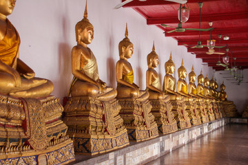 Golden Buddhas sitting at Wat Mahathat temples in Bangkok