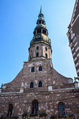 Fototapeta na wymiar Church of St. Peter is one of the symbols and one of the main sights of the city of Riga, Latvia. For a long time it was the tallest building in town.