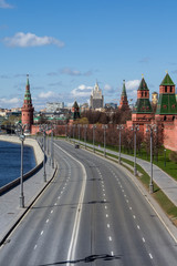 Obraz premium Covid-19, quarantine in Moscow, coronavirus in Russia. Empty streets without people. Self-quarantine in deserted city due to Covid virus pandemic. Kremlin embankment
