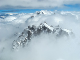 Fototapeta na wymiar Mont Blanc peak in the clouds, Chamonix France