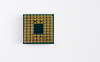 The golden side of the computer processor. Isolated
