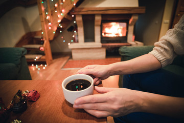 woman drinking coffee on the evening