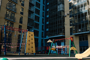 Outdoor playground for children. Fenced territory, coronavirus pandemic