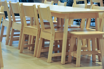 Chairs and tables in the interior. Elements of the interior. Close-up. Background without sharpness.