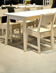 Chairs and tables in the interior. Elements of the interior. Close-up. Background without sharpness.