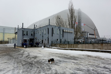 New Safe Confinement above remains of reactor 4 and old sarcophagus at Chernobyl nuclear power...