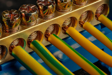 Naklejka premium Close-up image of a grounding bus bar terminal