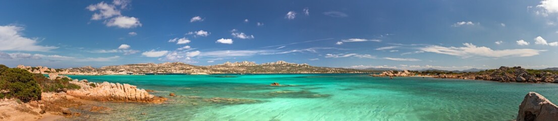 Panoramic view of the sunny beaches, and of the clear and transparent waters of the Maddalena island in Sardinia, Italy.