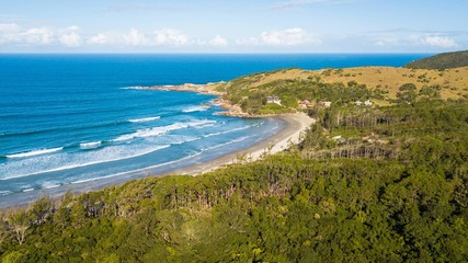 Fototapeta na wymiar Aerial view of Ouvidor beach - Garopaba. Beautiful beach and montains in Santa Catarina, Brazil